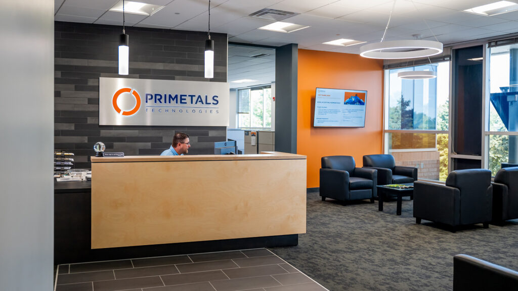 Reception desk and lounge seating within fifth floor lobby